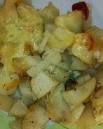 Картофель под сыром и овощами