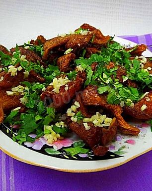 Жареные грибы с чесноком