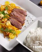 Утка с овощами и рисом