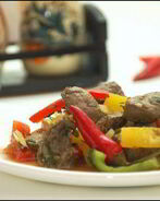 Тушеная печень с овощами