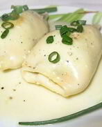 Кальмары, фаршированные овощами