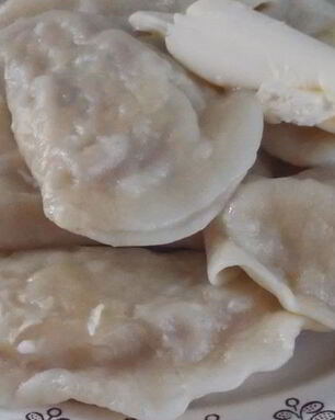 Вареники с квашеной капустой и мясом