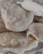 Вареники с квашеной капустой и мясом