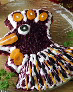 Петушок под шубой из селедки