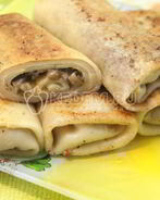 Фаршированные блины с грибами и сыром