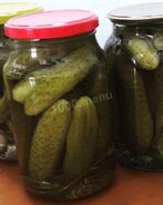 Маринованные огурцы в банках с гвоздикой