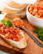 Баклажанная икра с помидорами и луком